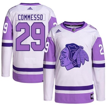 Authentic Adidas Men's Drew Commesso Chicago Blackhawks Hockey Fights Cancer Primegreen Jersey - White/Purple