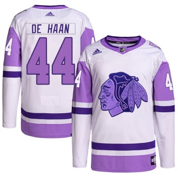 Authentic Adidas Youth Calvin de Haan Chicago Blackhawks Hockey Fights Cancer Primegreen Jersey - White/Purple