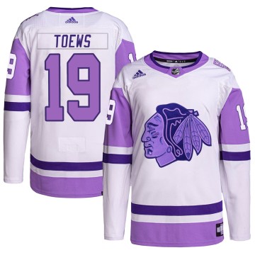 Authentic Adidas Youth Jonathan Toews Chicago Blackhawks Hockey Fights Cancer Primegreen Jersey - White/Purple