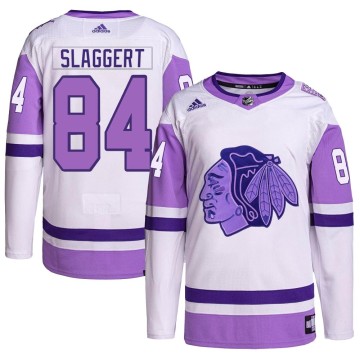 Authentic Adidas Youth Landon Slaggert Chicago Blackhawks Hockey Fights Cancer Primegreen Jersey - White/Purple